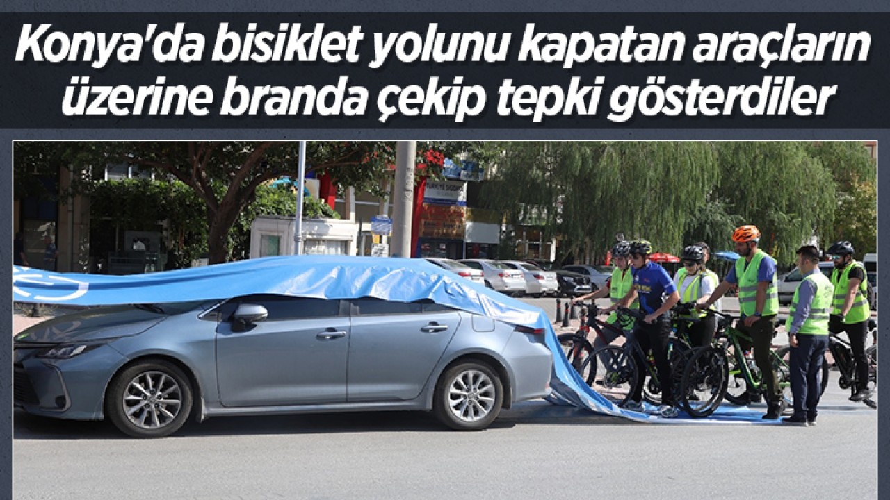 Konya’da bisiklet yolunu kapatan araçların üzerine branda çekip tepki gösterdiler